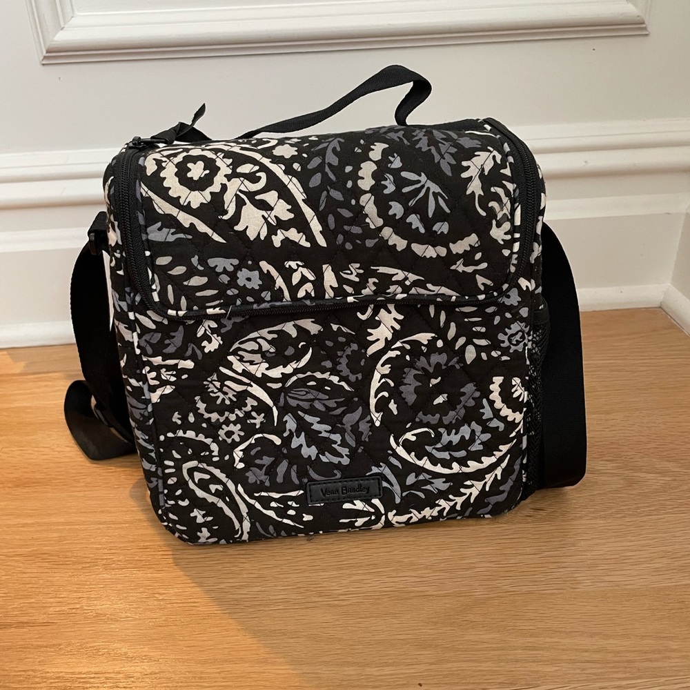 Vera Bradley large crossbody lined lunch box cooler with side bottle holder.